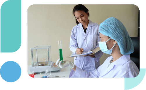 Employee reviewing personalized biometric screening results with a nurse